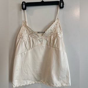 Zara off-white sleeveless blouse with flower detail